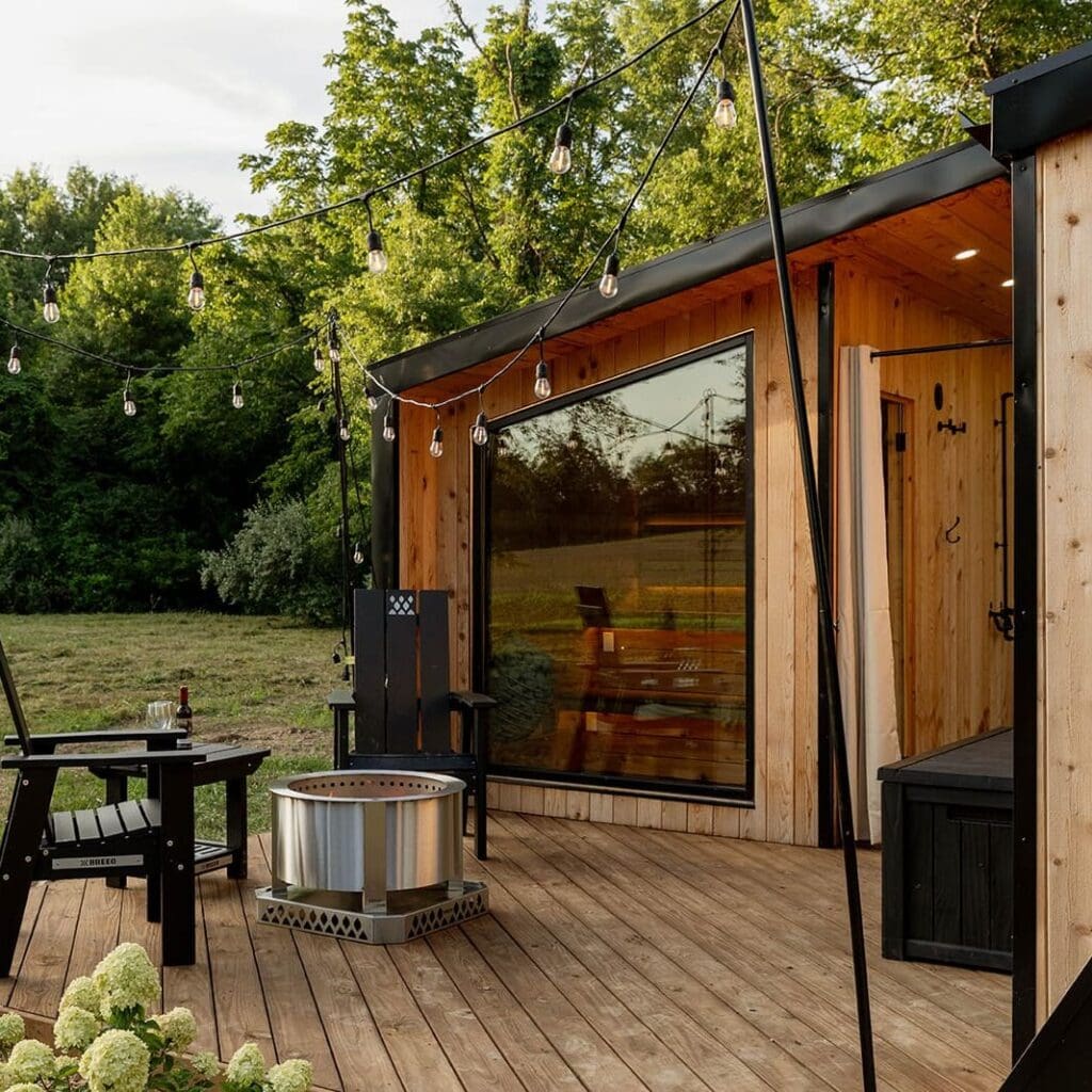 pine cabin porch with firepit